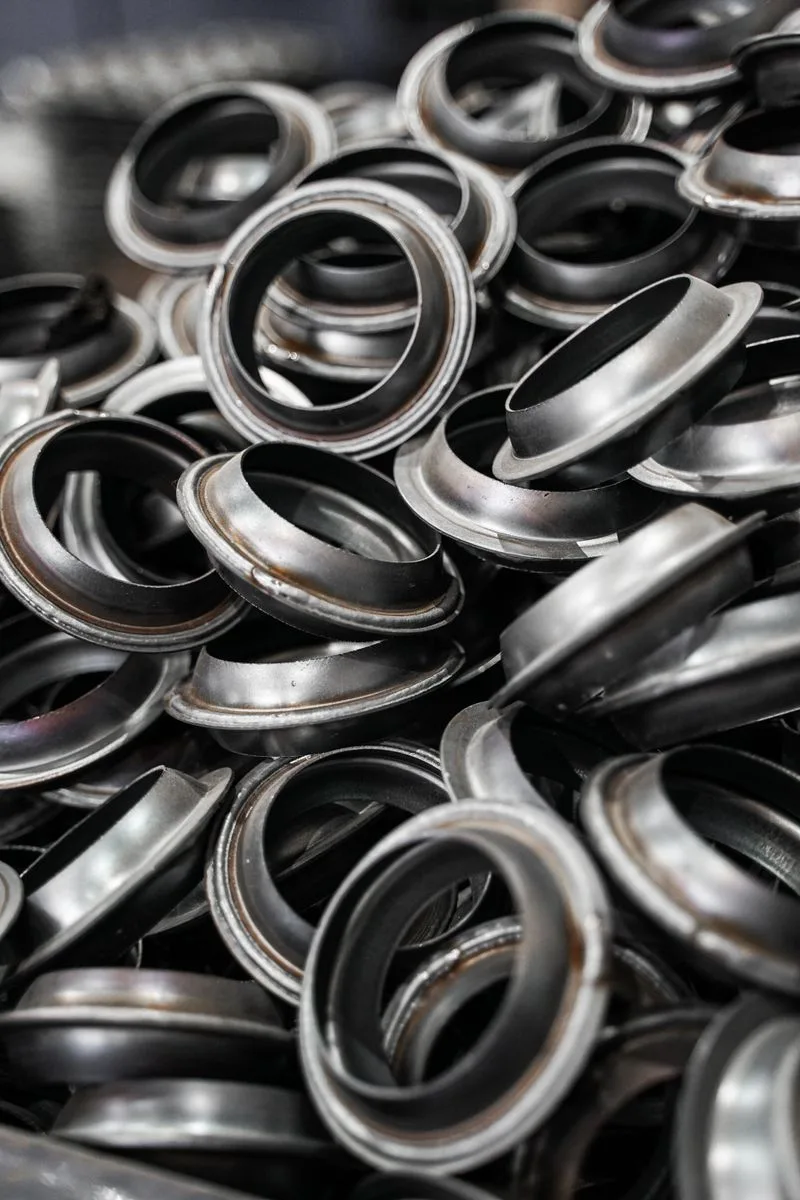 Stack of steel pipe flanges