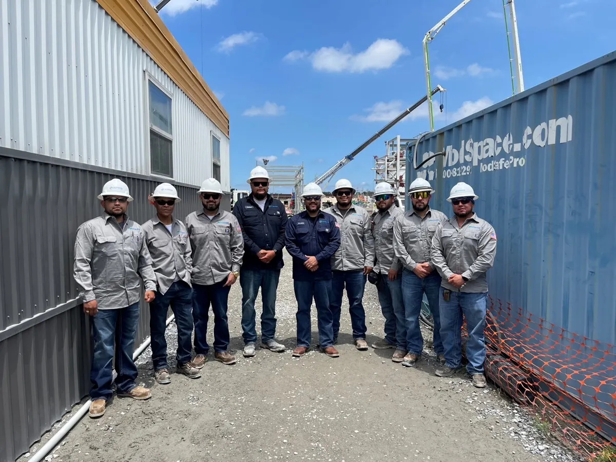 Sitewide instrumentation crew in hard hats on a project site